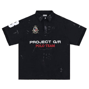 Eprolo LUXENK Badge Game Polo Shirt in navy with embroidered badge detail and classic collar, front view.