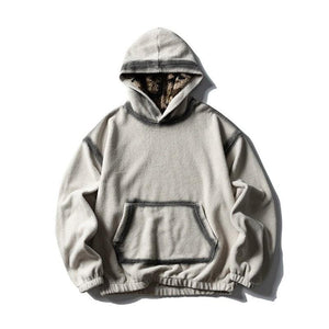 Men's hooded sweatshirt by eprolo, featuring a cozy fit and front pocket, shown in a casual style with a drawstring hood.