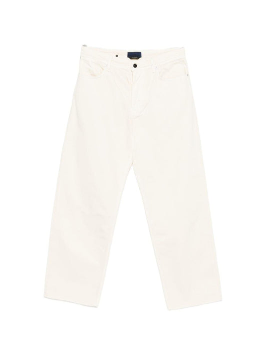 Stone Island denim cotton jeans featuring classic five-pocket design and signature branding, displayed on a neutral background.
