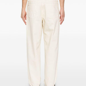 Stone Island Denim cotton jeans showing classic five-pocket design and branded patch on the waistband.