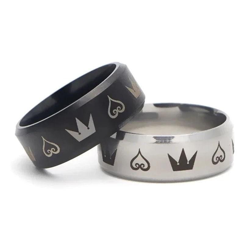 Eprolo LUXENK© Crown Ring featuring a detailed gold-tone band with a crown design, displayed on a neutral background
