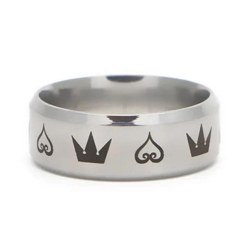Elegant LUXENK© Crown Ring by eprolo featuring a detailed crown design in polished metal on a plain background.