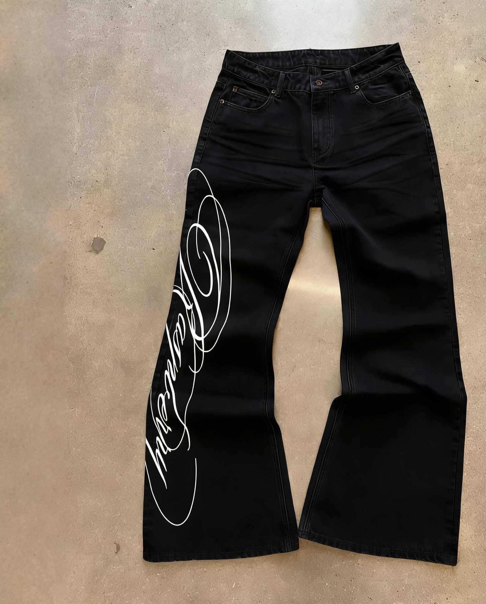 Light blue LUXENK© "Street Letter" jeans by eprolo, featuring a casual fit with distressed details and street-style design.