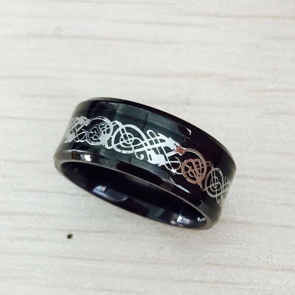 Elegant LUXENK "Nibelung" ring by eprolo featuring intricate design and a polished silver finish.