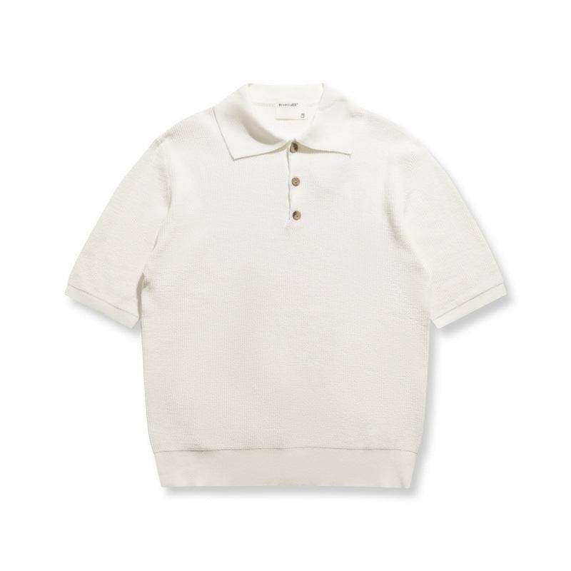 Light blue LUXENK© "Clean Tone" polo shirt by eprolo, showing the collar and chest with buttons and short sleeves.