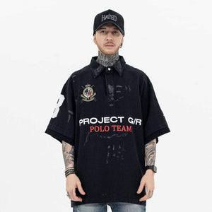 Eprolo Luxenk Badge Game Polo Shirt in navy with embroidered badge detail, short sleeves, and classic collar.