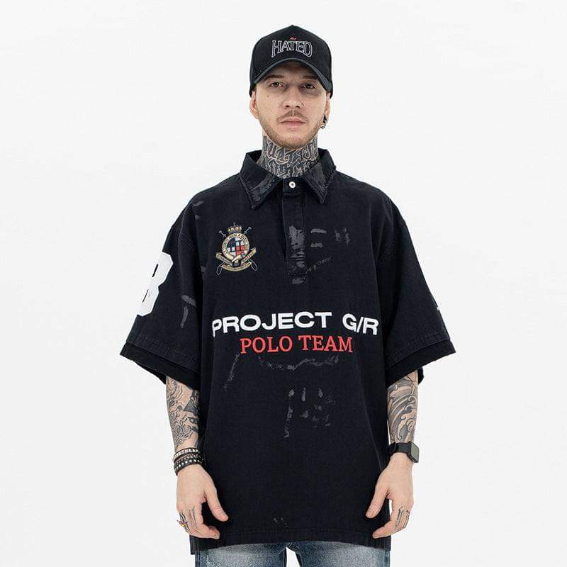 Eprolo Luxenk Badge Game Polo Shirt in navy with embroidered badge detail, short sleeves, and classic collar.