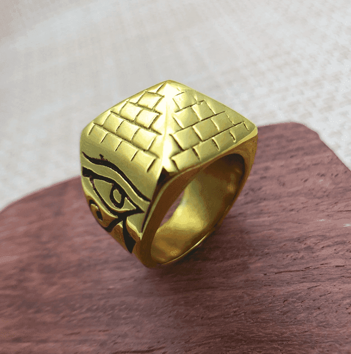 Silver LUXENK© "Horus Eye" ring with detailed eye design and engraved band, showcasing craftsmanship and intricate metalwork.