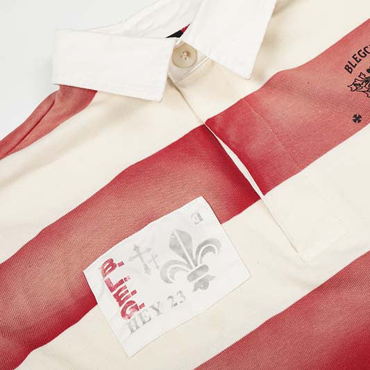 Badge graffiti cross print striped long sleeved polo shirt