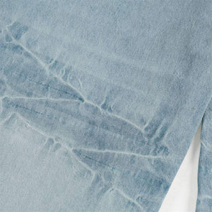 Light blue Luxenk Lightning Wash jeans from eprolo with distressed details and a slim fit, displayed on a mannequin.