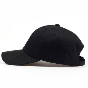 Black "Uchiha" cap by LUXENK© featuring the Uchiha clan logo, adjustable strap, and embroidered design for fans of Naruto.