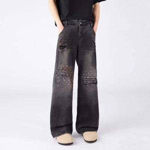 Eprolo LUXENK© Raw Edge Jeans with distressed hem and classic five-pocket design, shown in dark denim.