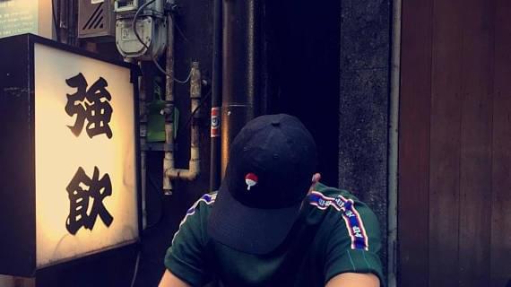 Black LUXENK Uchiha cap by eprolo featuring the iconic red and black Uchiha clan symbol embroidered on the front.
