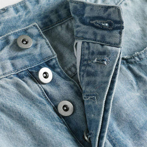 Light blue Luxenk© Lightning Wash jeans by eprolo, featuring a distressed denim style with fading and lightning-inspired details.