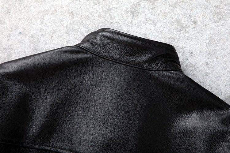 Black men's motorcycle leather jacket by Inland Leather Co., featuring a classic design and genuine leather construction.