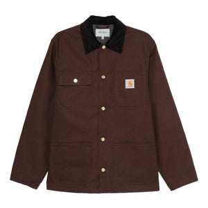 Carhartt Wip Main jacket in black, men's casual outerwear with durable fabric and classic design, displayed on a hanger.