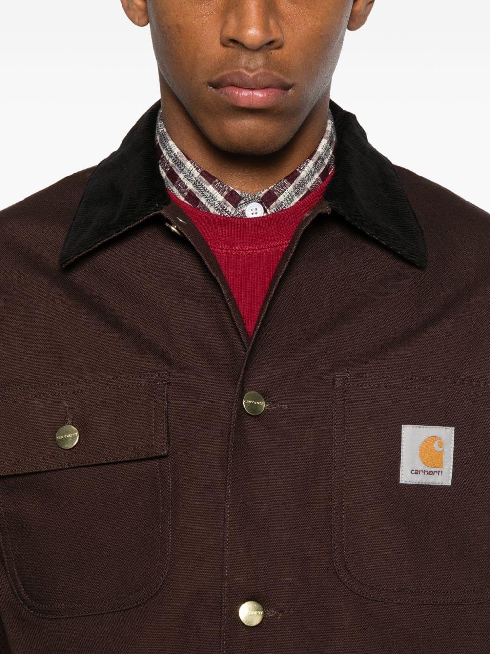 Carhartt Wip Main jacket, men's casual outerwear, black color, front view showing durable fabric and classic design.