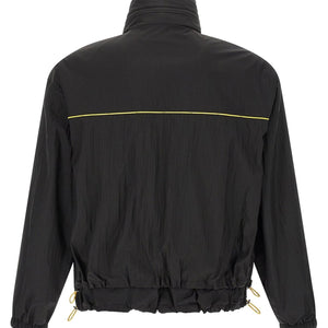 Fendi reversible windbreaker jacket featuring sleek design, with visible Fendi logo and stylish two-tone fabric in the image.