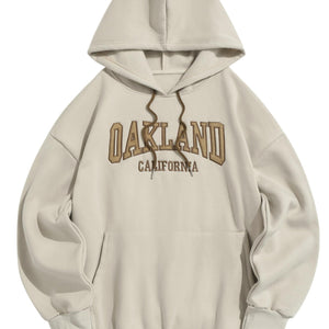 Light coffee LUXENK Oakland hoodie with a relaxed fit, featuring a hood and soft fabric for comfortable casual wear.