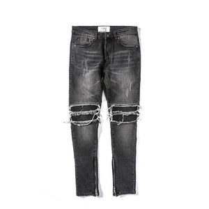 Black LUXENK Moto Leather jeans with a slim fit design, featuring detailed stitching and classic five-pocket style.