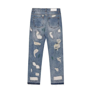 Blue LUXENK "Ripped Summer" jeans with distressed details and slim fit, shown on a model.