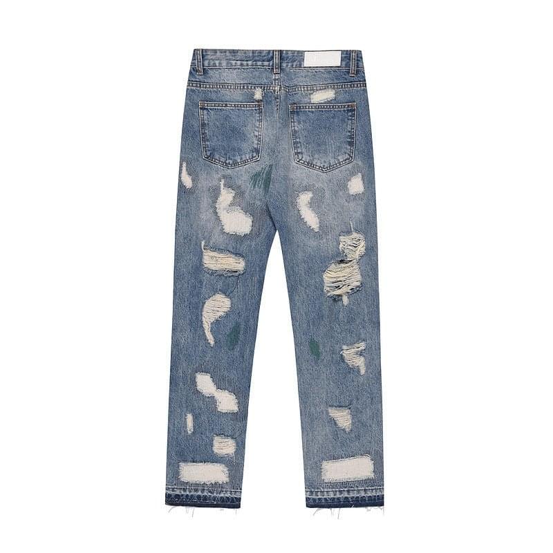 Blue LUXENK "Ripped Summer" jeans with distressed details and slim fit, shown on a model.