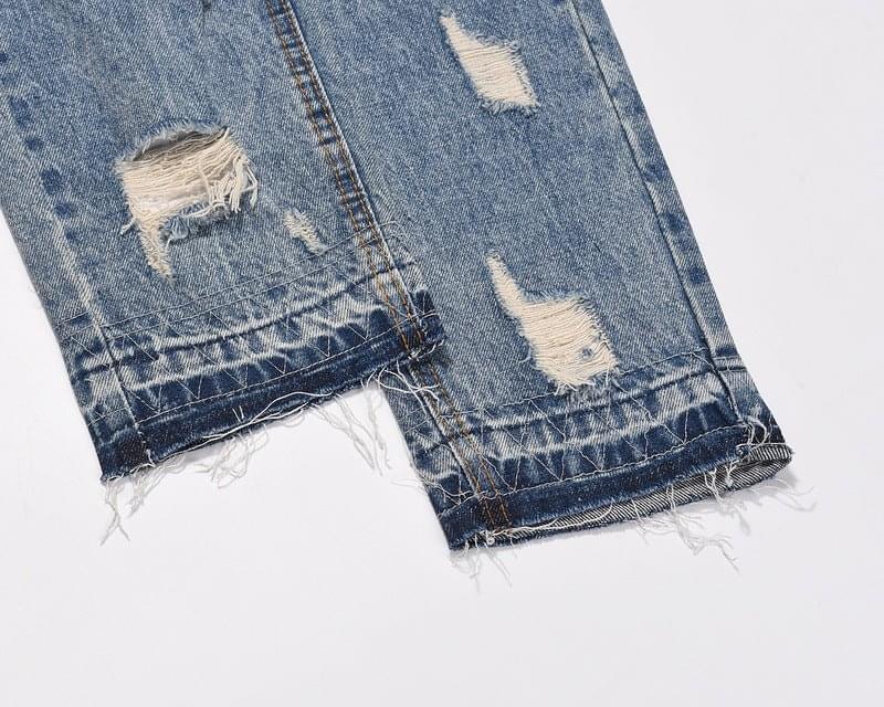 Blue LUXENK Ripped Summer Jeans with distressed details and a relaxed fit, displayed on a neutral background.