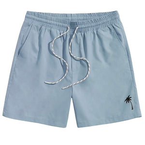 Medium blue LUXENK Letter Graphic Track Shorts with printed text and comfortable elastic waistband.