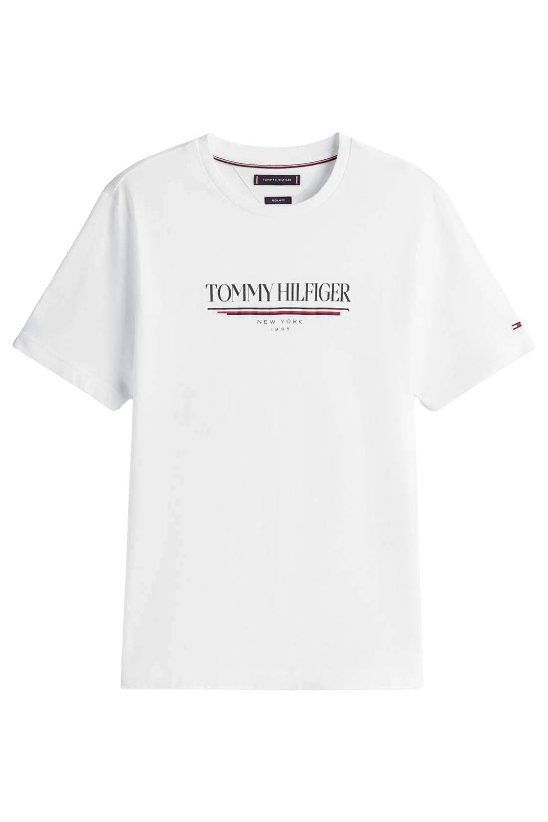 White Tommy Hilfiger men's short sleeve T-shirt with logo, size L, casual crew neck and comfortable fit.