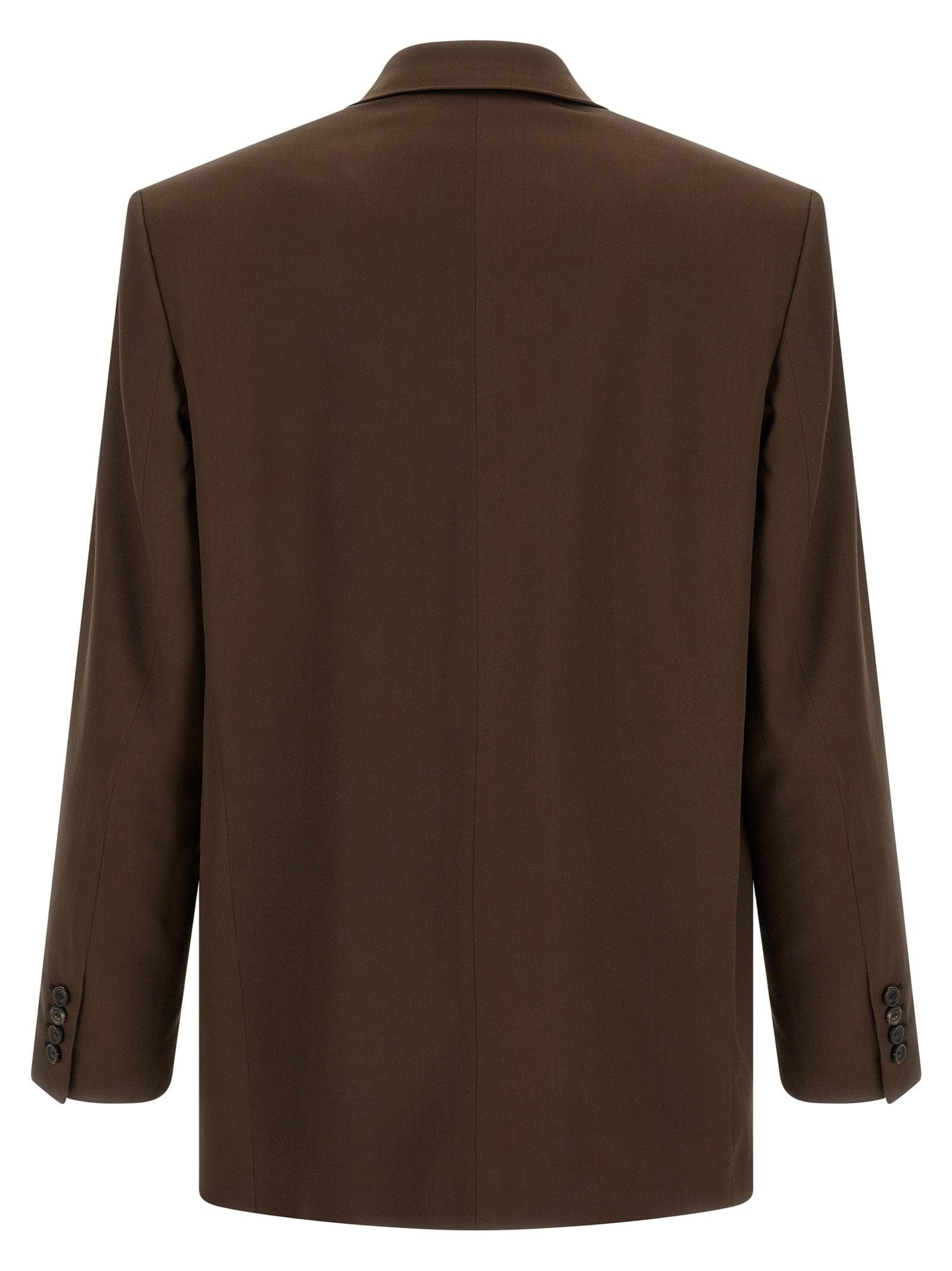 Saint Laurent satin blazer jacket in a sleek, tailored style, featuring smooth fabric and classic design details.