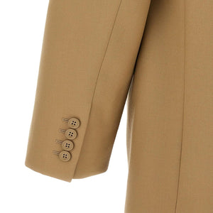 Saint Laurent Yves blazer in black, tailored jacket with structured fit and classic lapels, displayed on a hanger.