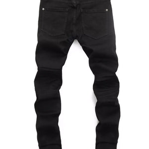 Black Luxenk Slim Fit Jeans by Trendsi, showing a close-up of the tapered denim with subtle stitching details.