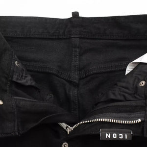Black LUXENK© Slim Fit Jeans by Trendsi, showcasing a close-up of the fitted denim fabric and clean stitching.