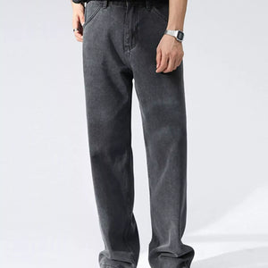 Black and gray Luxenk Relaxed Wide Leg Jeans by Trendsi, showing relaxed fit and wide-leg style on a model.