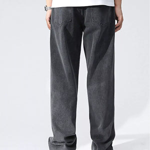 Black and gray Luxenk Relaxed Wide Leg Jeans by Trendsi, showcasing a comfortable fit and trendy casual style.