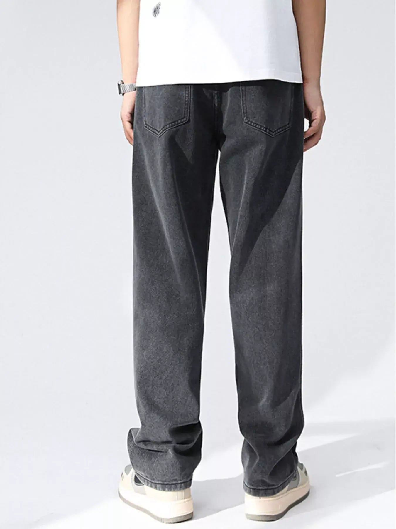 Black and gray Luxenk Relaxed Wide Leg Jeans by Trendsi, showcasing a comfortable fit and trendy casual style.