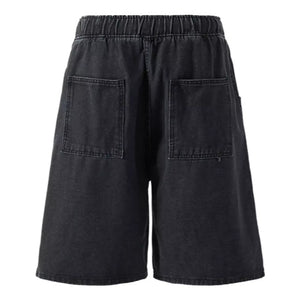Black Luxenk loose fit washed denim shorts by Trendsi, shown on a model, featuring casual style and relaxed fit.