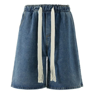 Black Luxenk loose fit washed denim shorts from Trendsi, featuring a casual, relaxed fit and stylish distressed details.