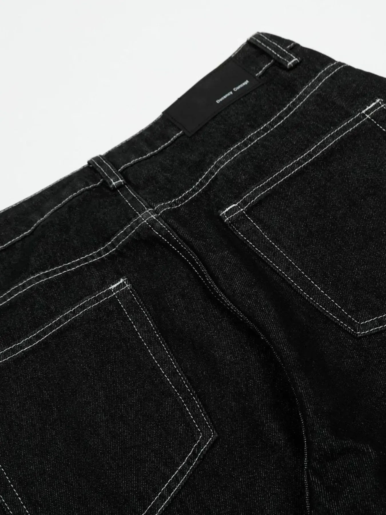 Black LUXENK Contrast Stitch Jeans by Trendsi, slim fit with visible contrast stitching and classic denim texture.