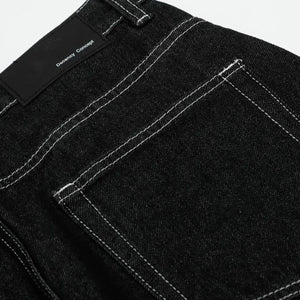 Black LUXENK© Contrast Stitch Jeans by Trendsi, featuring classic stitching and a slim fit, displayed on a white background.