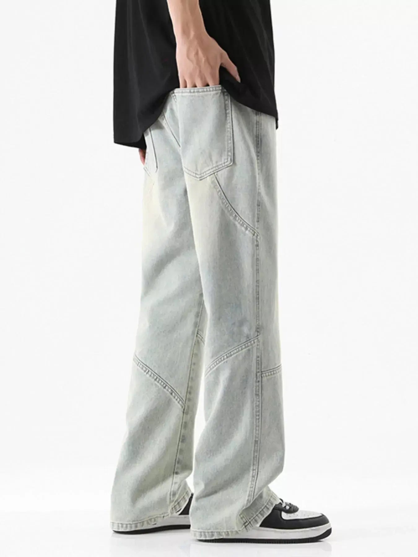 Black Luxenk© drawstring wide-leg jeans from Trendsi, featuring a relaxed fit and casual style.