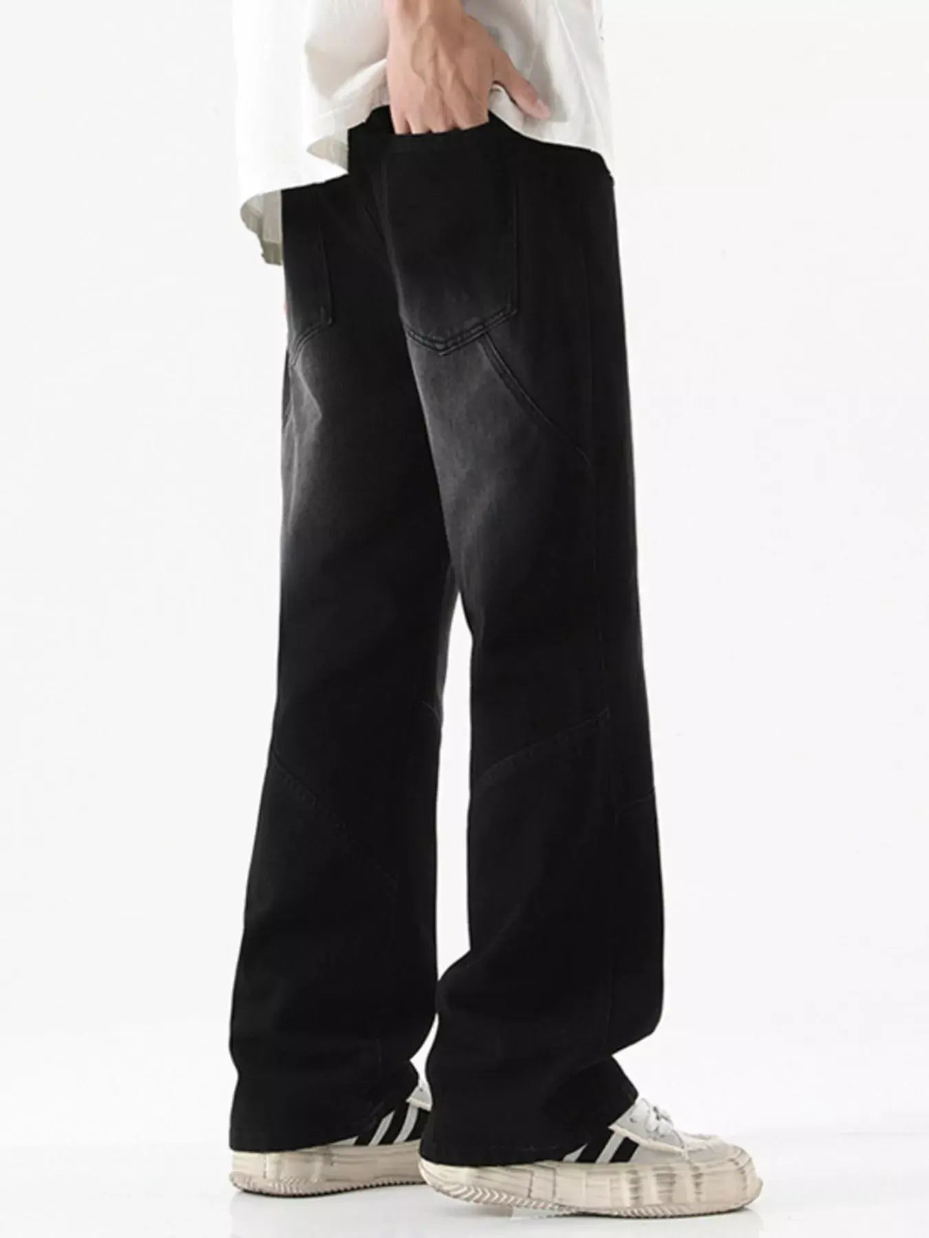 Black Luxenk© Drawstring Wide Leg Jeans from Trendsi, featuring a relaxed fit, high waist, and casual style.