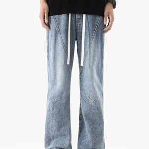 Black Luxenk© drawstring wide-leg jeans from Trendsi, featuring a relaxed fit and casual style, shown on a model.