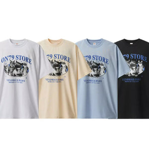 Black LUXENK© "Graphic" T-shirt from Trendsi, featuring a bold printed design on the front, laid flat on a white background.