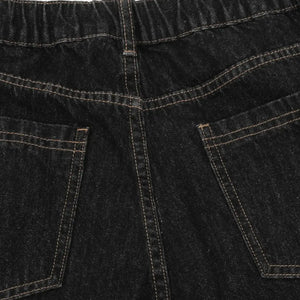 Black denim shorts with plaid accent details from LUXENK© "Plaid Accent Denim" collection by Trendsi, featuring a casual fit.
