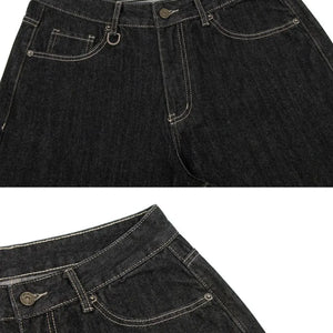 Black Luxenk pocketed loose denim shorts by Trendsi, featuring a relaxed fit and casual style, shown on a model.