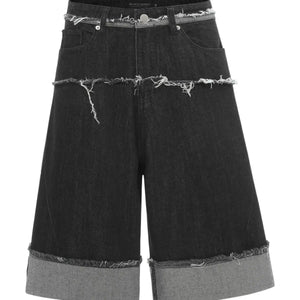 Black Luxenk© Raw Hem Bermuda Shorts by Trendsi, showcasing a casual fit with frayed raw hem detail.