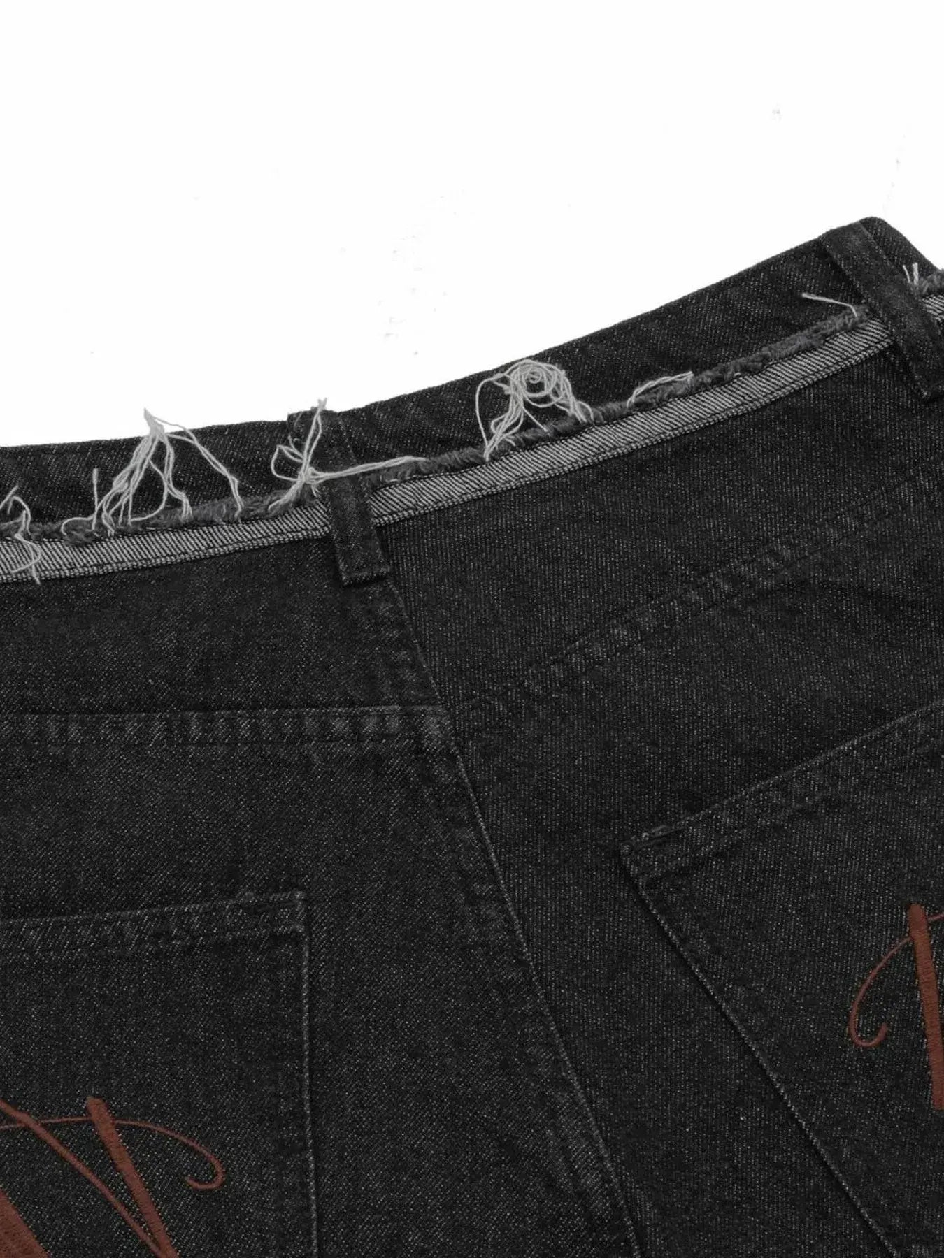 Black Luxenk Raw Hem Bermuda Shorts by Trendsi, featuring a casual raw hem design and comfortable fit.