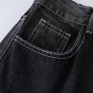 Black LUXENK Vintage Wide Leg Jeans by Trendsi, featuring a relaxed fit and classic denim style, shown on a model.
