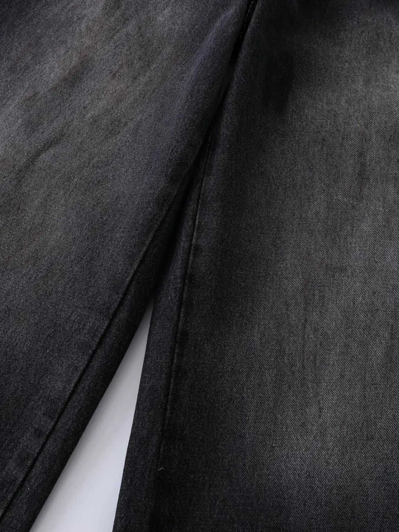 Black Luxenk Vintage Wide Leg Jeans by Trendsi featuring a relaxed fit, high waist, and classic denim style.